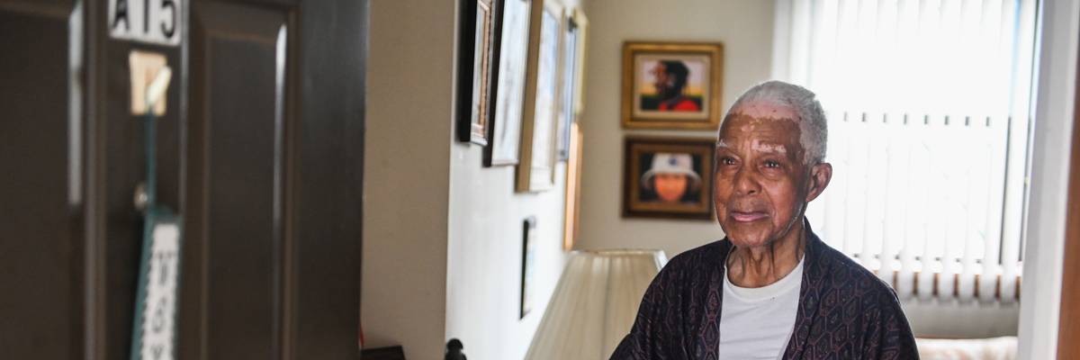 94-year-old Edward Bates receives a meal delivery from the Wyandanch Nutritional Center in Wyandanch, New York on March 17, 2020.