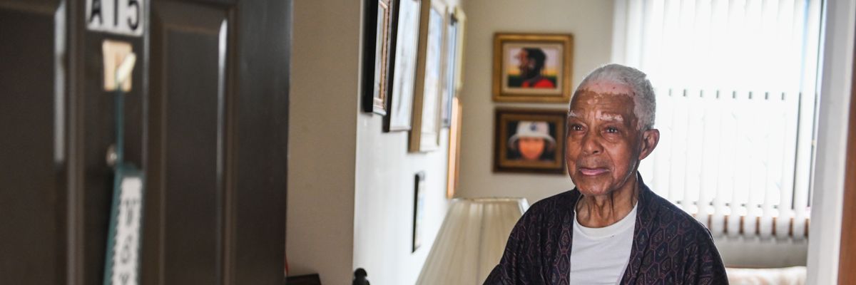 94-year-old Edward Bates receives a meal delivery from the Wyandanch Nutritional Center in Wyandanch, New York on March 17, 2020.