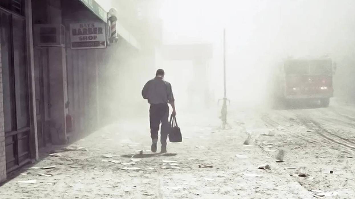 A 9/11 survivor walks down New York City's carnage-strewn streets