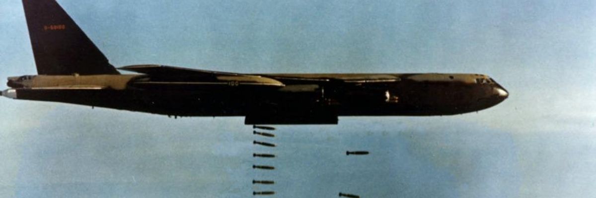 A B-52 drops bombs.