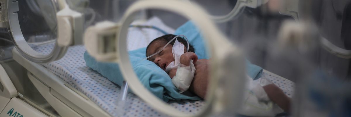 a baby in an incubator