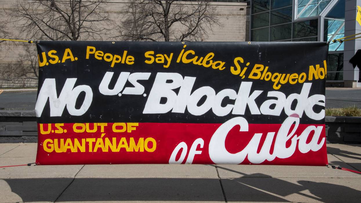 A banner argues against the US blockade on Cuba.