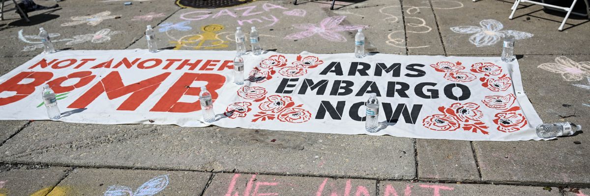 A banner calling for an arms embargo