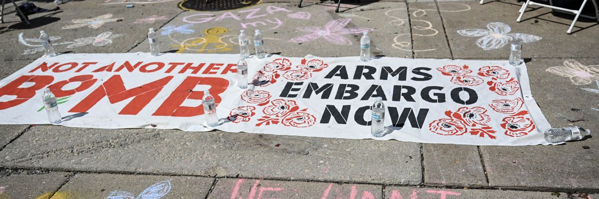 A banner calling for an arms embargo