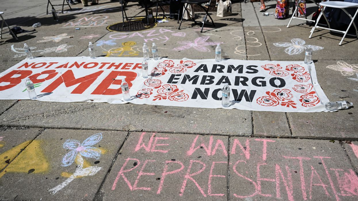 A banner calling for an arms embargo