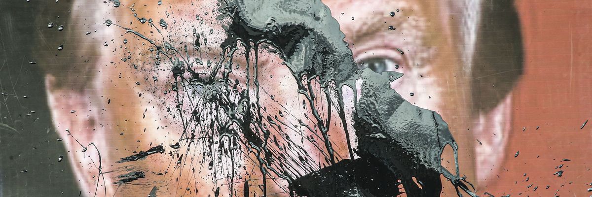 A banner depicting United States President Donald Trump