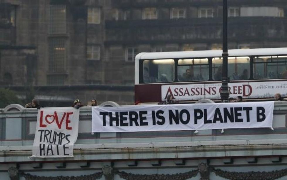 A banner drop in Edinburgh, Scotland. (Photo: Reuters)