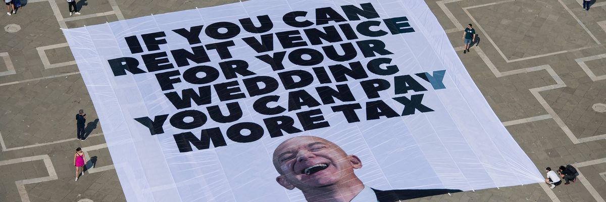 A banner reading, "If you can rent Venice for your wedding, you can pay more tax"