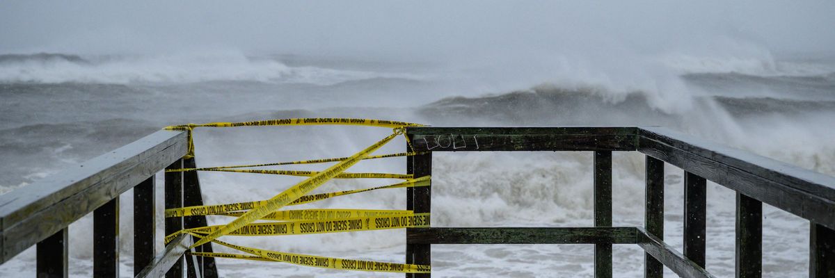A beach access point is closed as waves from Tropical Storm Henri approach Long Island, New York on August 22, 2021.