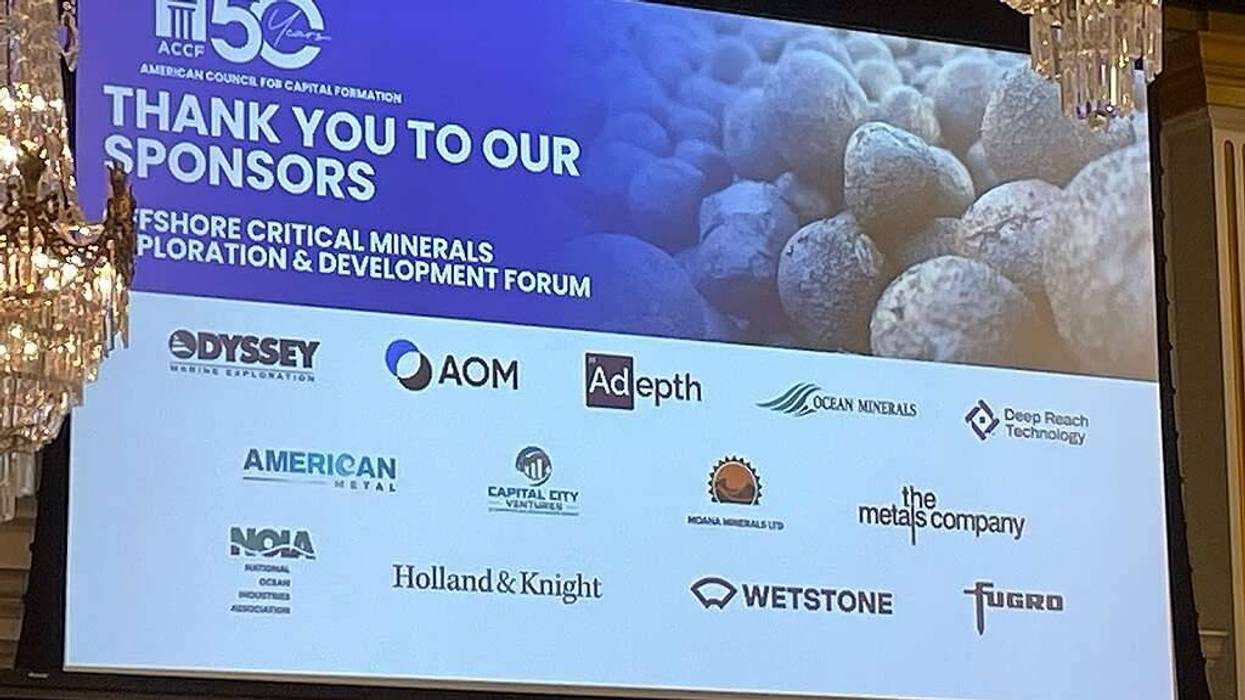 A billboard advertises the Offshore Critical Minerals Exploration and Development Forum.