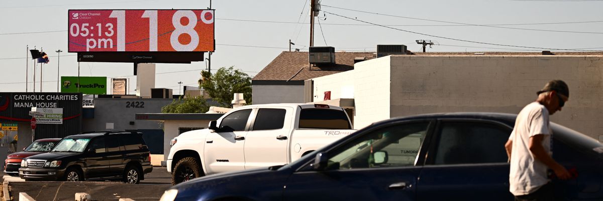 A billboard displays a temperature of 118°F