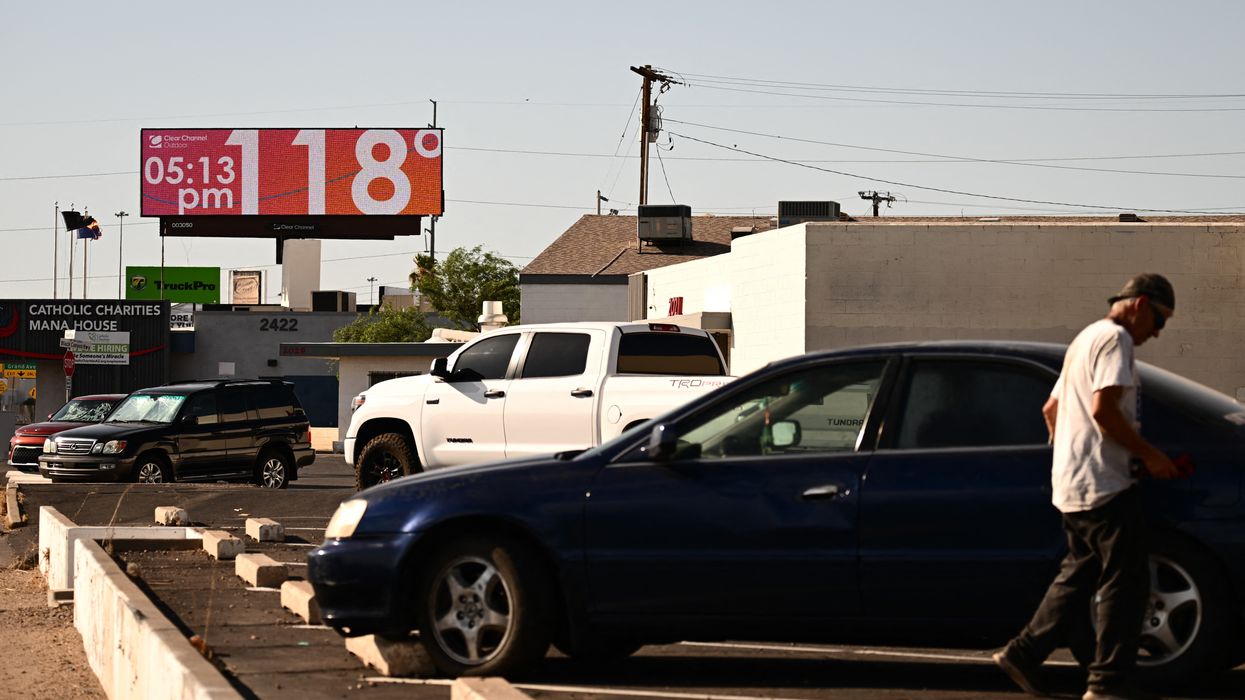 A billboard displays a temperature of 118°F
