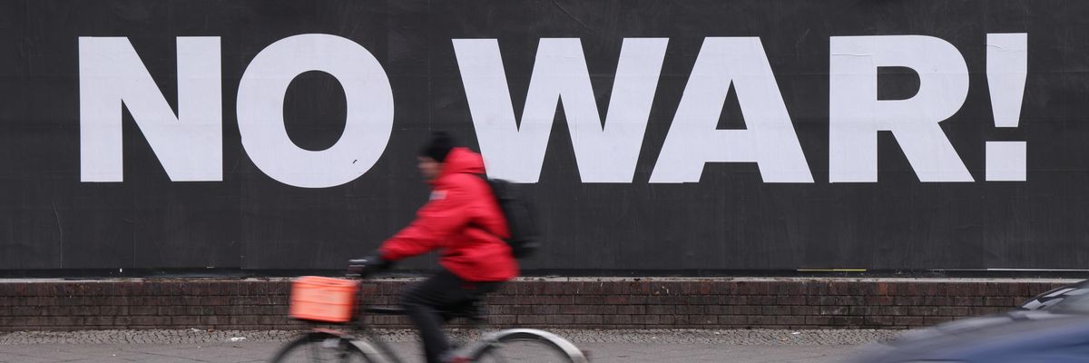 A billboard hanging outside a night club reads: "No War!" on January 18, 2022 in Berlin, Germany.