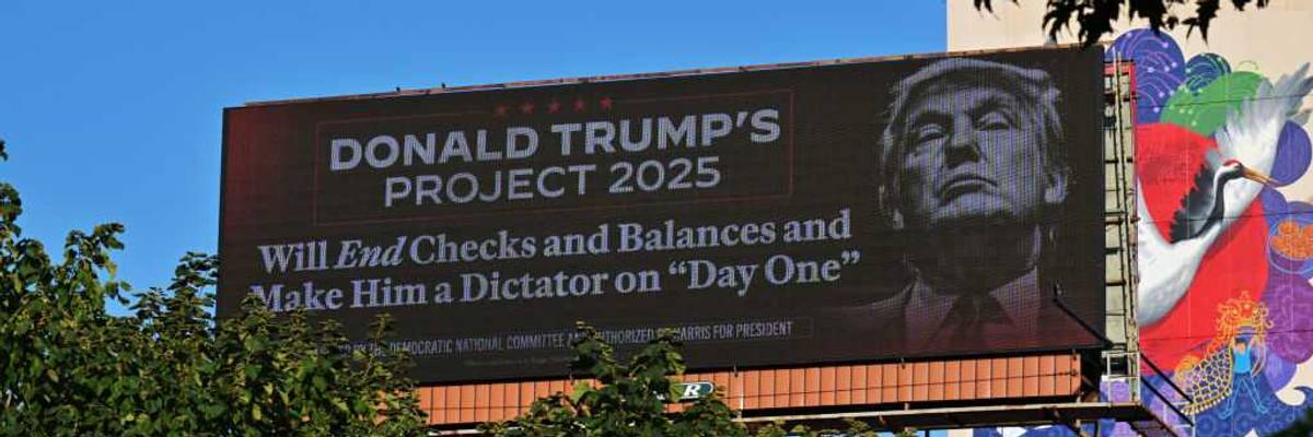 A billboard warns against Project 2025.