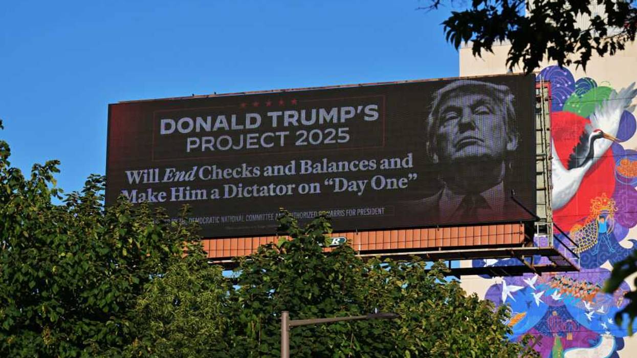 A billboard warns against Project 2025.