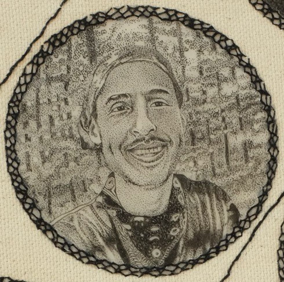 A black-and-white crosss-stitch of Tortuguita.