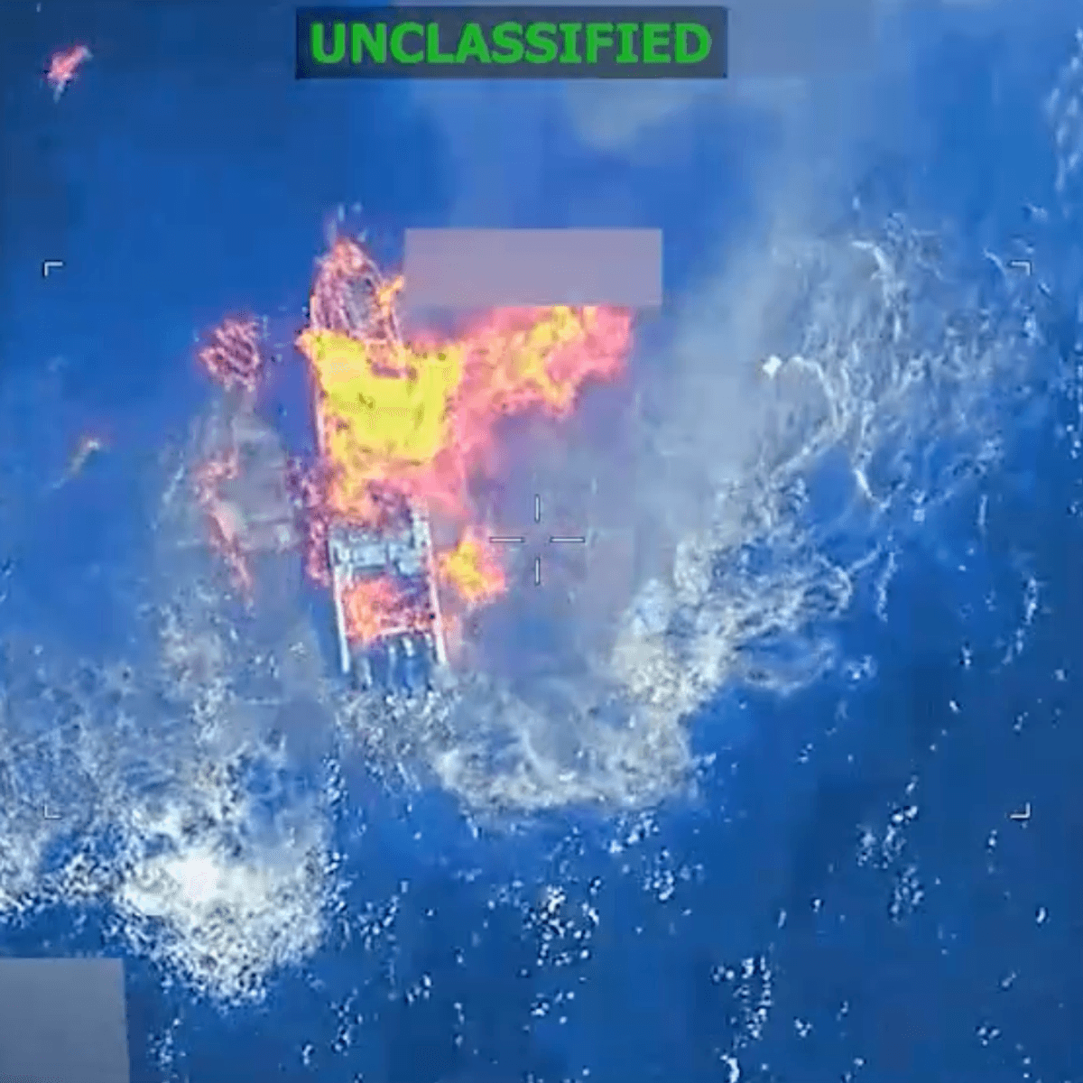 A boat burns after being bombed by US forces in the Pacific Ocean