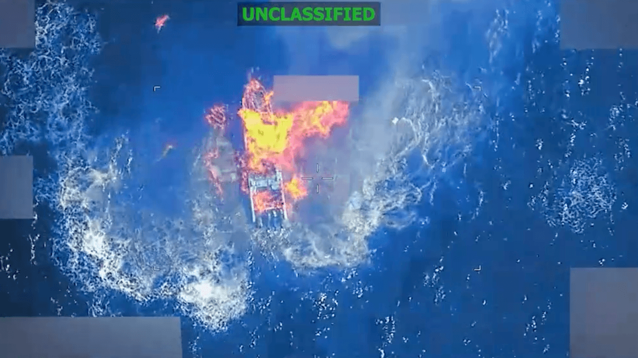 A boat burns after being bombed by US forces in the Pacific Ocean