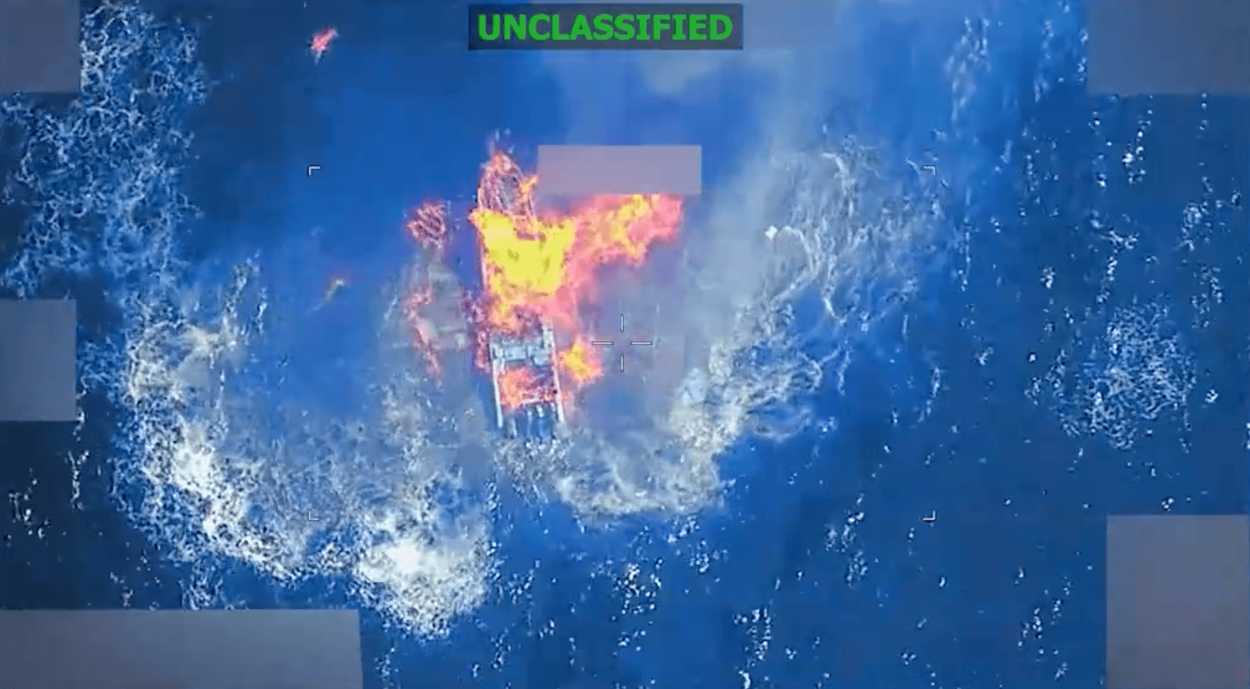A boat burns after being bombed by US forces in the Pacific Ocean