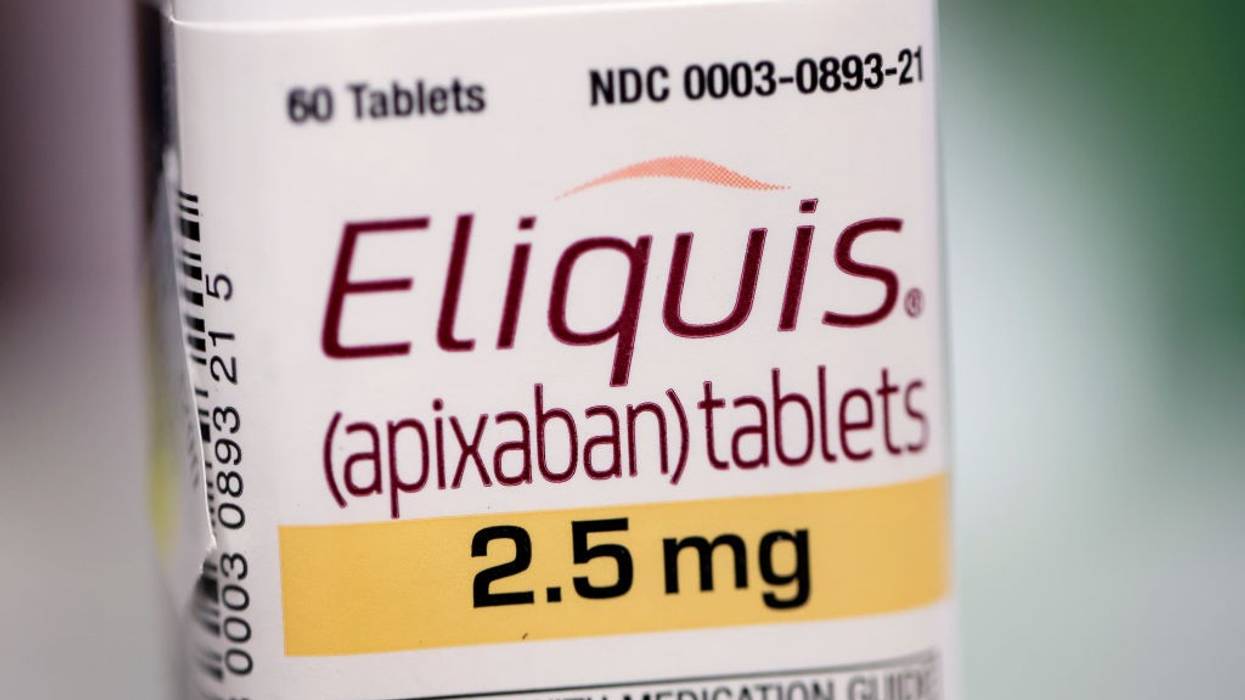 A bottle of Eliquis 2.5 mg tablets.