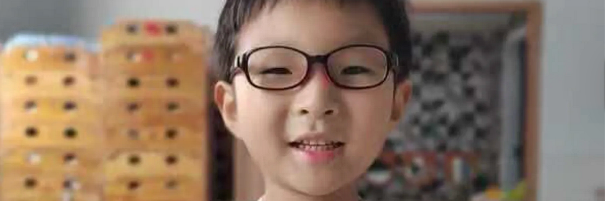 A boy named Yuanxin, age 6, was separated from his father during a check-in at 26 Federal Plaza in New York City