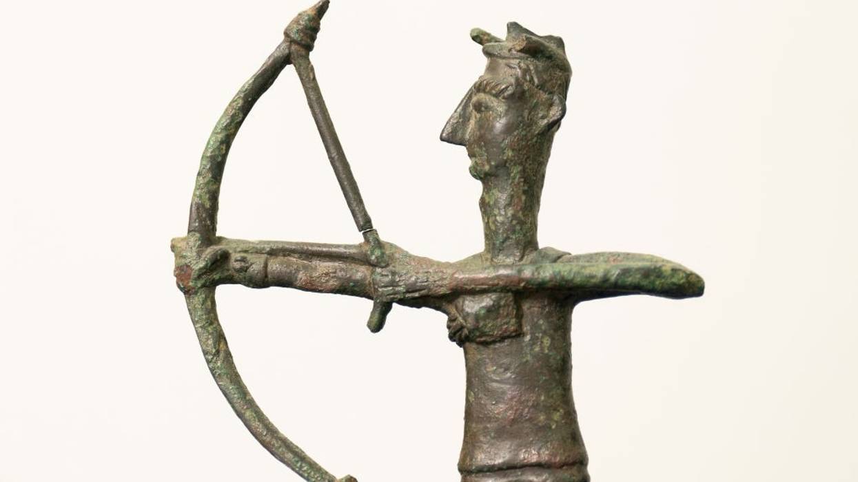 A bronze figure of an archer from Sardinia.