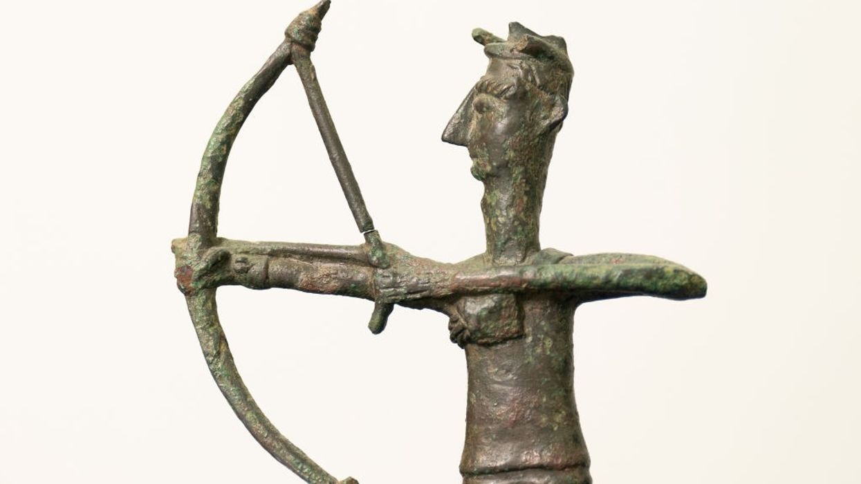 A bronze figure of an archer from Sardinia.