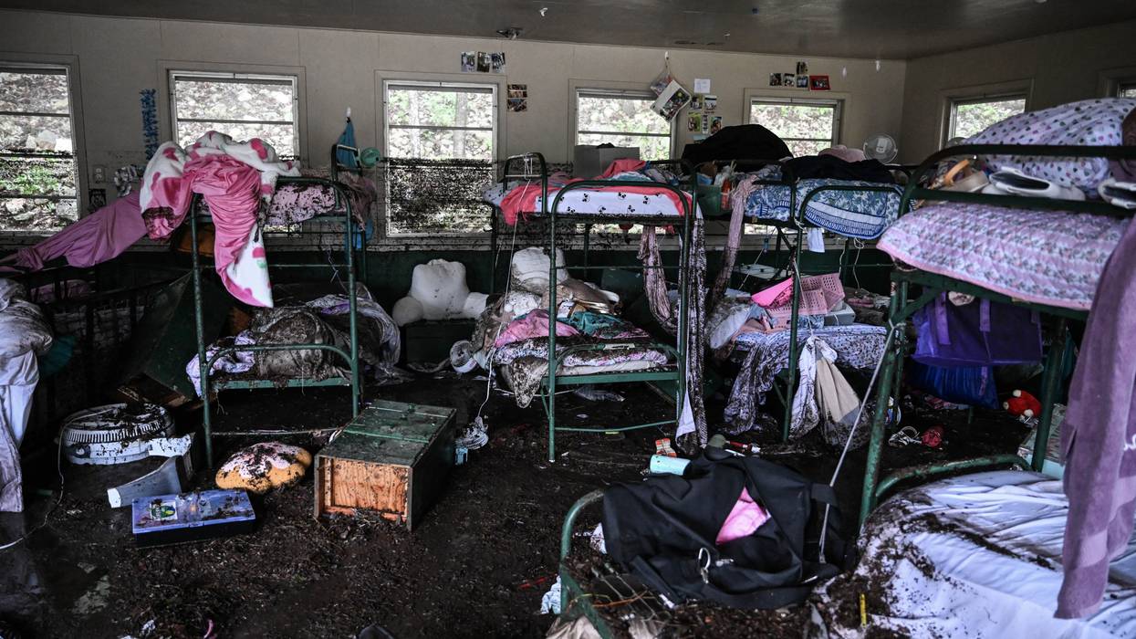 A cabin damaged in Texas flooding.