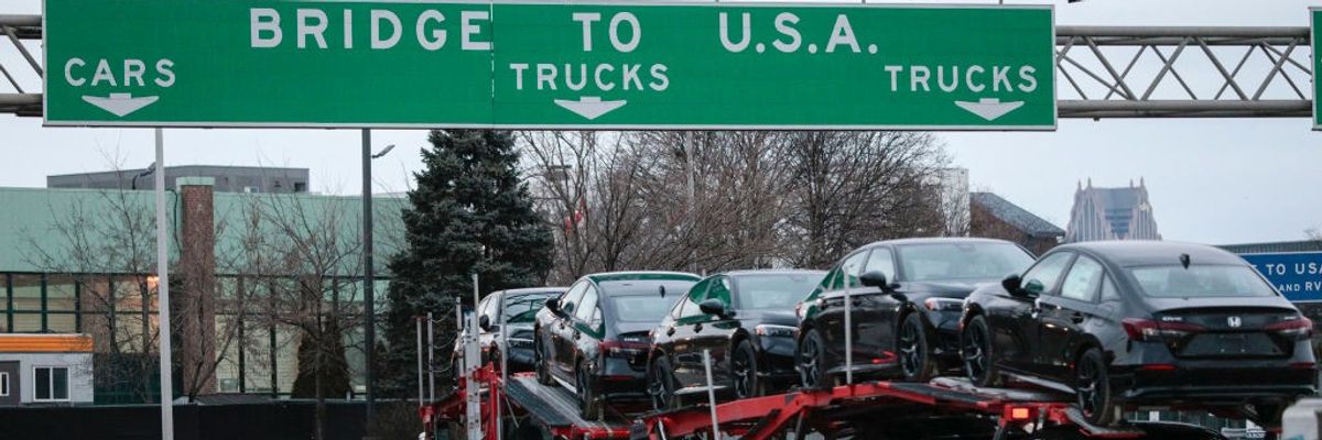 A car hauler heads to cross the Ambassador Bridge