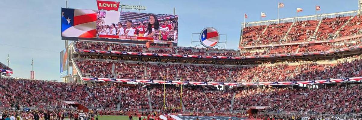 A cheerleader for the San Francisco 49ers took a knee before the NFL team's victory over the Oakland Raiders on Nov. 1 2018