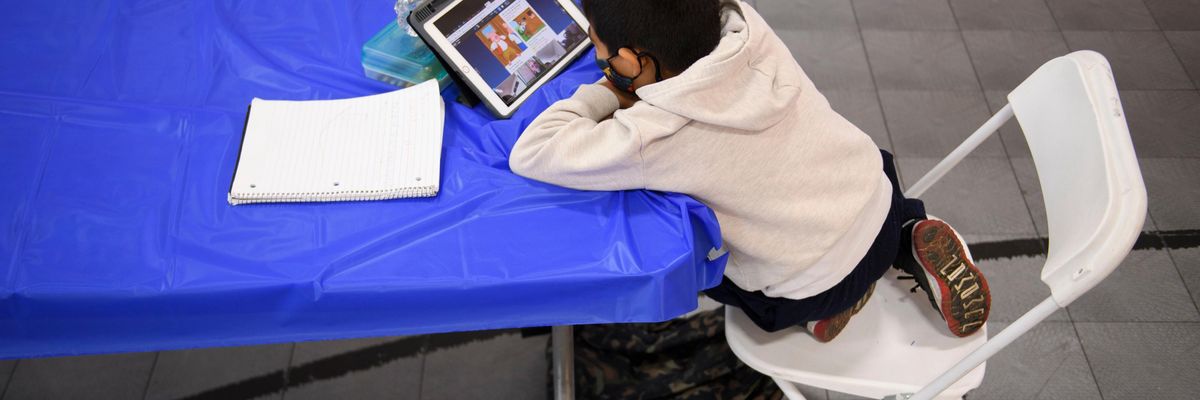 A child attends an online class at a learning hub inside the Crenshaw Family YMCA during the Covid-19 pandemic on February 17, 2021 in Los Angeles. (Photo: Patrick T. Fallon/AFP via Getty Images)