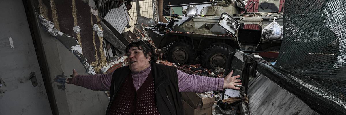 A civilian reacts after Ukrainian soldiers took back Chernihiv region from Russian forces on April 2, 2022. (Photo: Metin Aktas/Anadolu Agency via Getty Images)