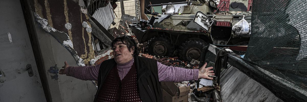 A civilian reacts after Ukrainian soldiers took back Chernihiv region from Russian forces on April 2, 2022. (Photo: Metin Aktas/Anadolu Agency via Getty Images)