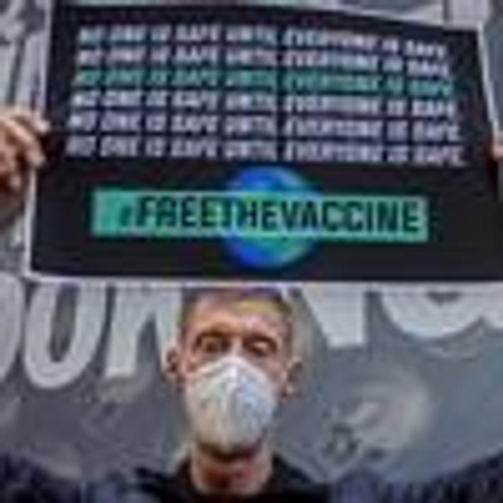 A coalition of healthcare advocacy community organizations gathered outside Pfizer Worldwide Headquarters in Manhattan on March 11, 2021.