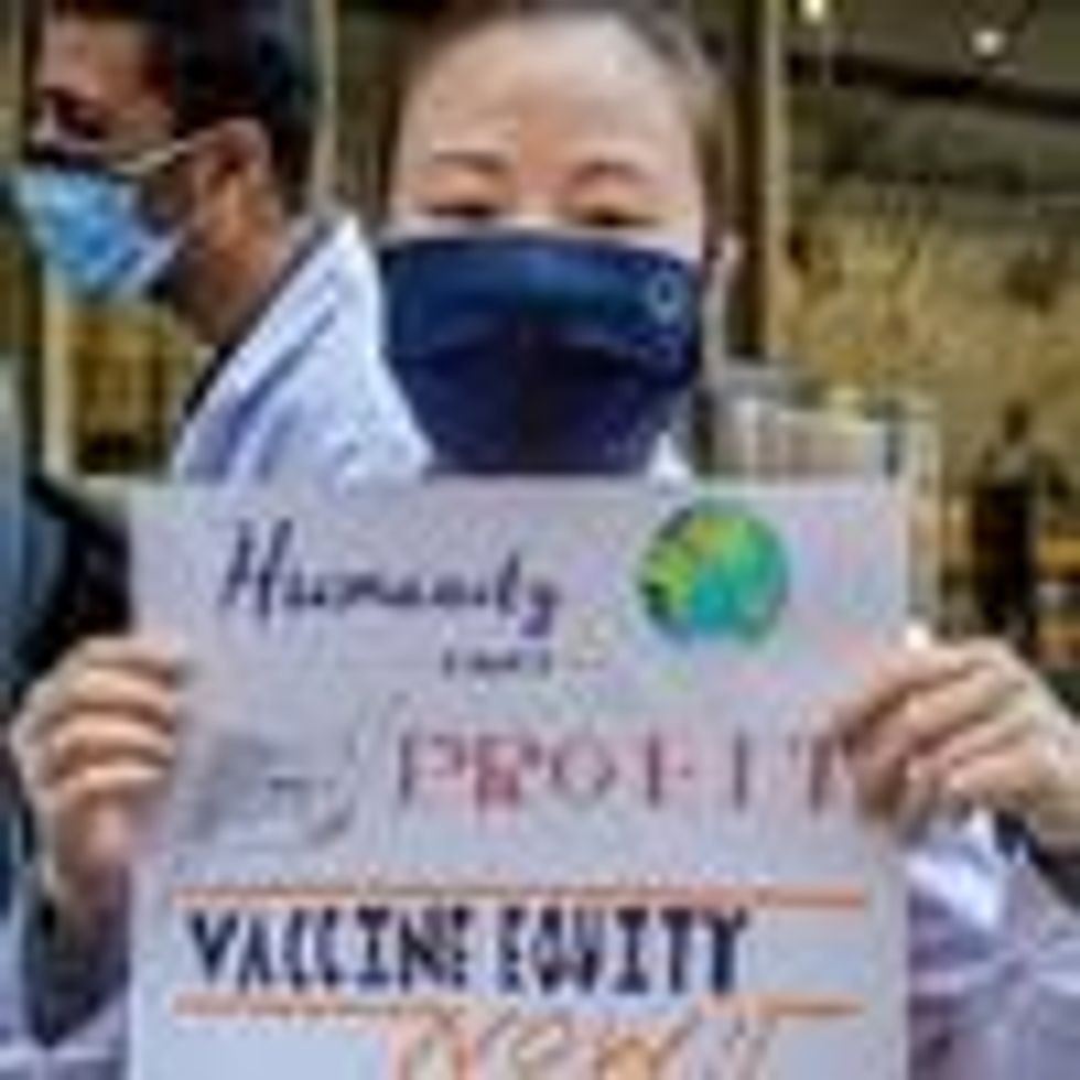 A coalition of healthcare advocacy organizations gathered outside Pfizer Worldwide Headquarters in Manhattan on March 11, 2020. (Photo: Erik McGregor/LightRocket via Getty Images)