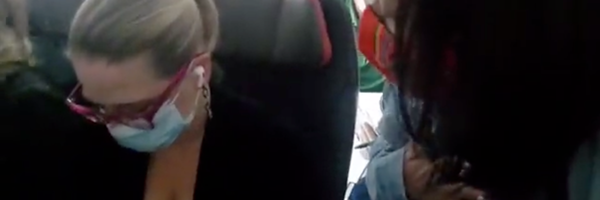 A constituent approaches Sen. Kyrsten Sinema