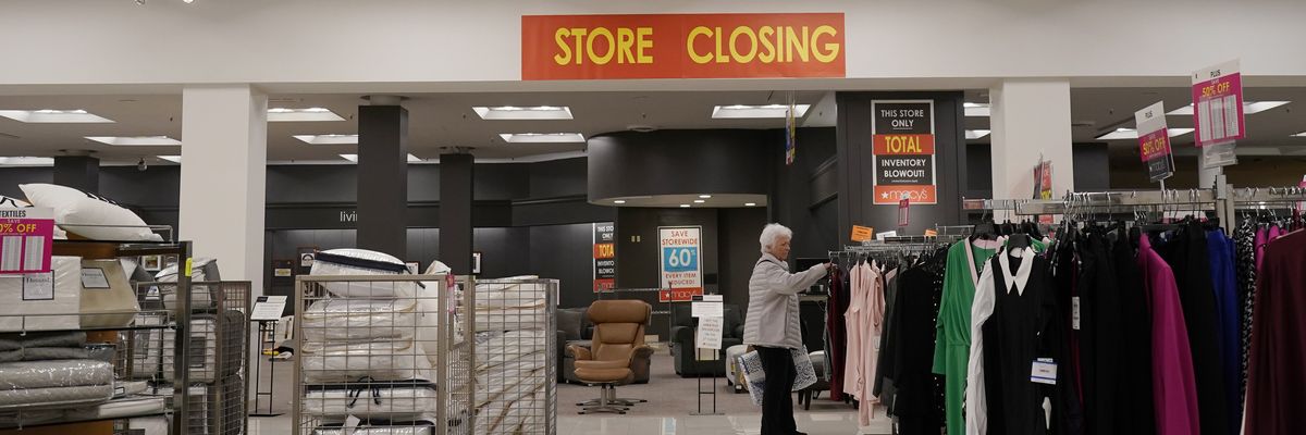 A customer shops at a Macy's store