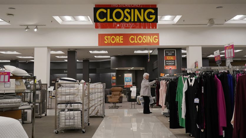 A customer shops at a Macy's store