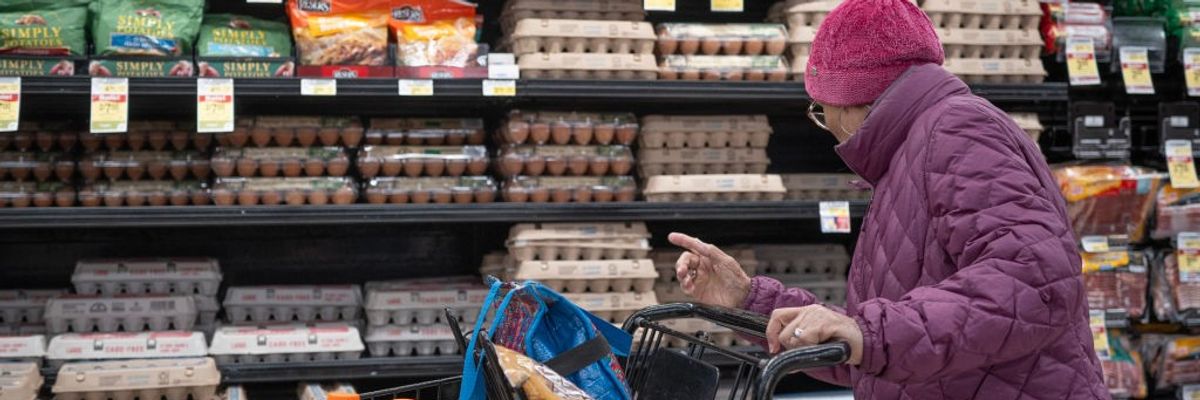 A customer shops for eggs at a grocery store in Illinois