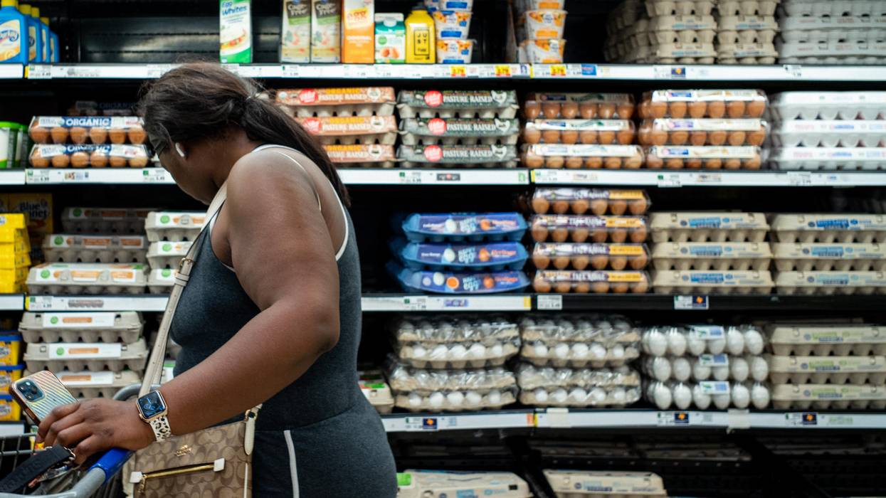 A customer shops for eggs at a Kroger grocery store on August 15, 2022 in Houston, Texas.