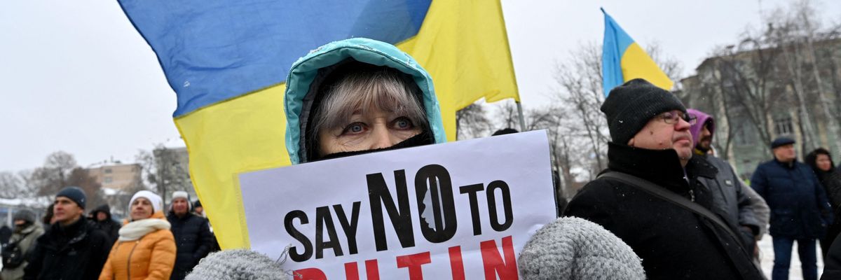 A demonstrator holds a placard during an action dubbed #SayNOtoPutin in Kyiv, Ukraine on January 9, 2022