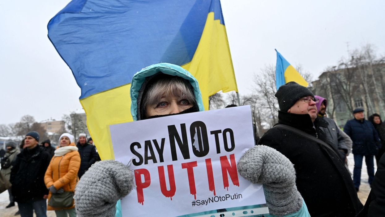 A demonstrator holds a placard during an action dubbed #SayNOtoPutin in Kyiv, Ukraine on January 9, 2022