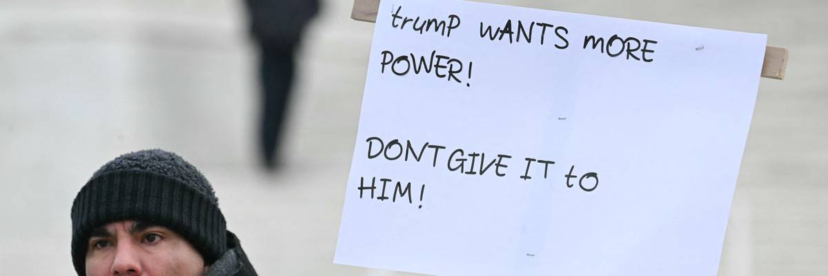 A demonstrator holds up a sign outside the US Supreme Court
