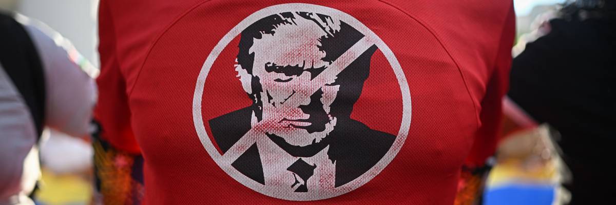 A demonstrator protests US military attacks