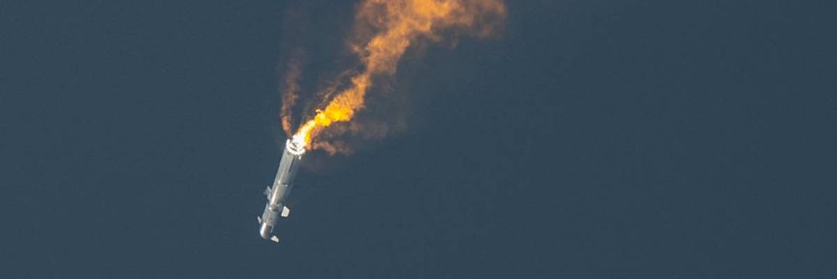 A descending rocket explodes