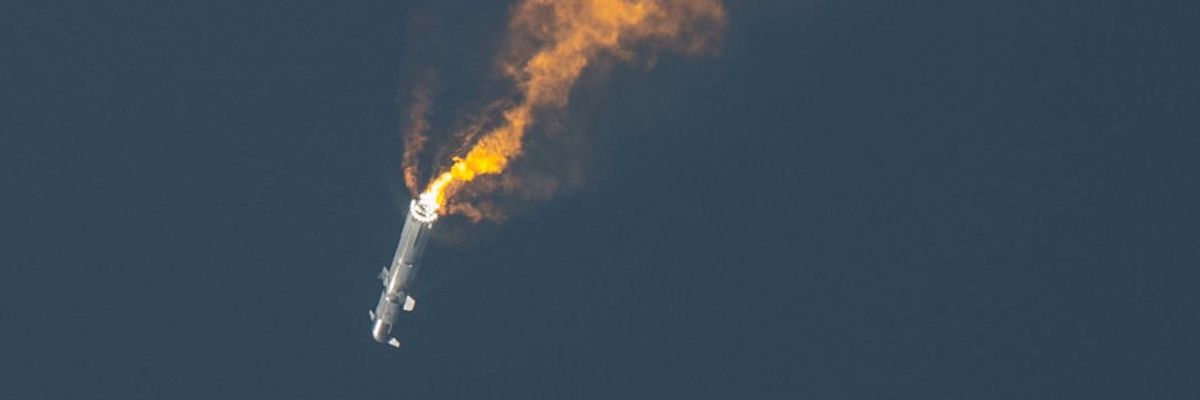 A descending rocket explodes