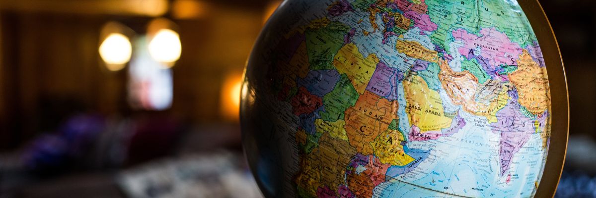 A desk globe on a table.