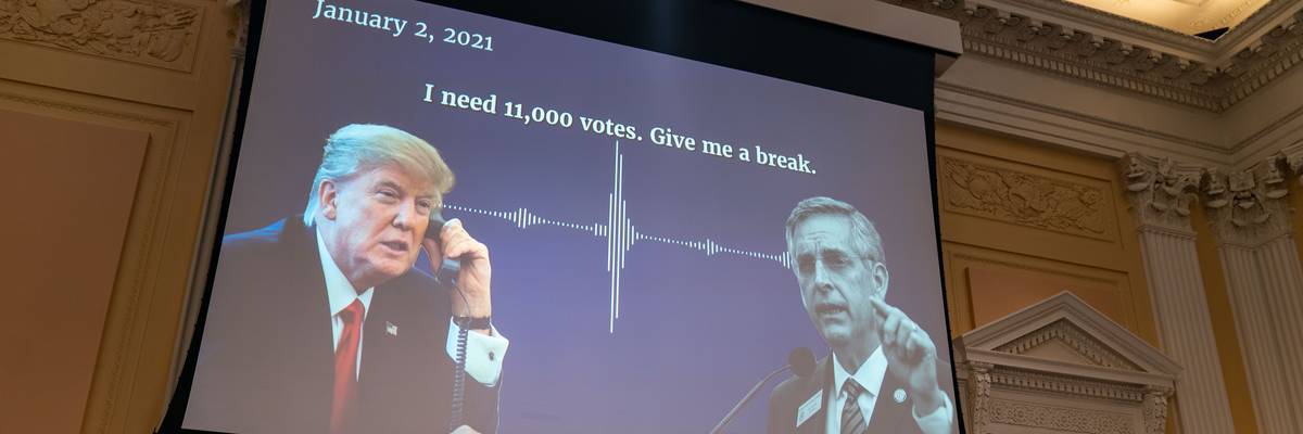 A digital presentation of President Donald Trump speaking with Georgia Secretary of State Brad Raffensperger