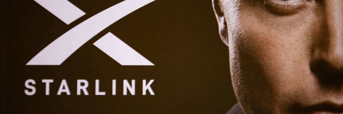A double exposure photograph shows a portrait of Elon Musk and the Starlink company logo