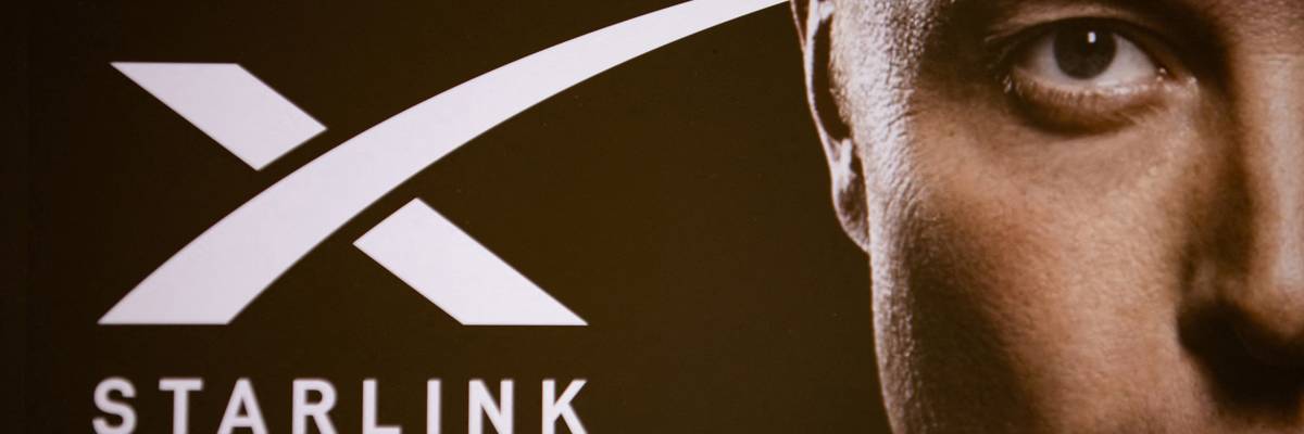 A double exposure photograph shows a portrait of Elon Musk and the Starlink company logo